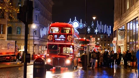 Red old design double decker bus starts Christmas time, London, UK Stock Footage 116137479