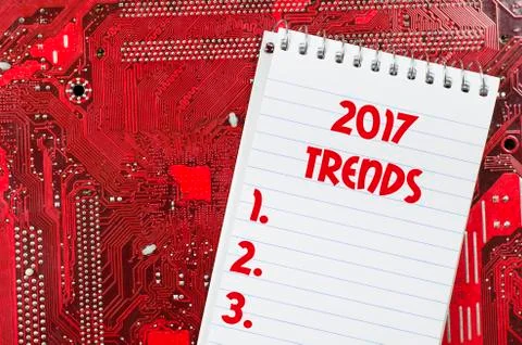 Red old dirty computer circuit board and 2017 trends text concept Stock Photos