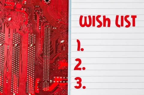 Red old dirty computer circuit board and wish list text concept Stock Photos