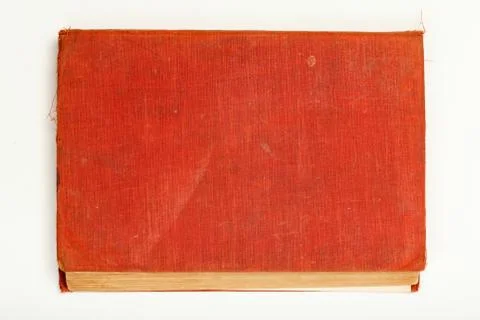 Red old hardback book on white background. Stock Photos
