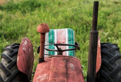 Red old tractor front part Stock Photos