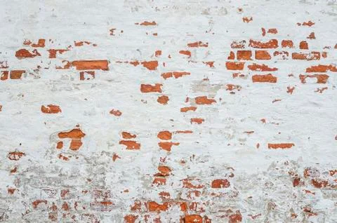 Red Old Weathered Brick Wall With Beaten Pieces Of Whitewash, Putty And Plast Stock Photos
