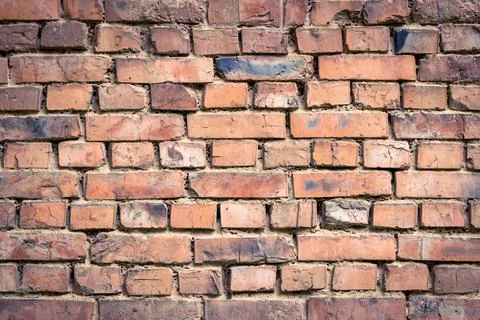 Red old worn brick wall background. Vintage effect. Abstract pattern of brick 写真素材