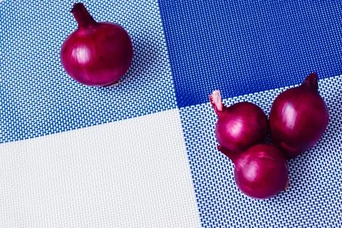 Red onion and white onion on a background divided into four parts Stock Photos
