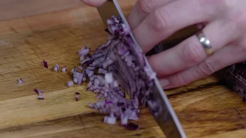 Red onion chopped in slow motion Stock Footage 166863364
