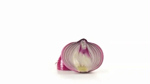 Red onion cut in half side view Stock Footage 102717677