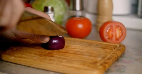 Red onion cutting closeup Stock Footage 87252163