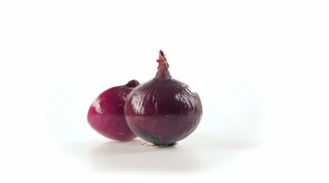 Red onion front view many Vidéo 23730515