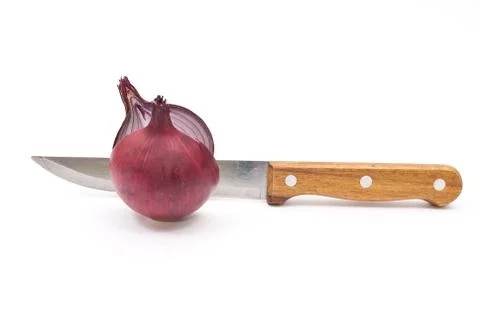Red onion with knife Stock Photos