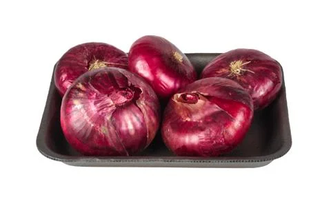 Red onion on plastic packaging isolated on white Stock Photos