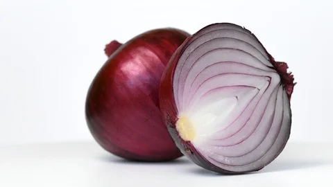 Red onion rotating on white background Stock Footage 114806862
