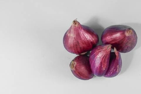 Red onion, shallots on white background Stock Photos