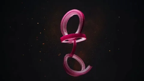 Red Onion Slices fall and Rotating on dark Background Stock Footage 332661397