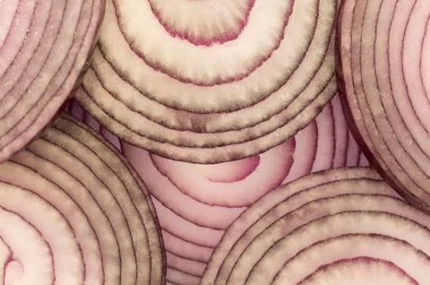 Red onion slices stacked over each other Stock Photos
