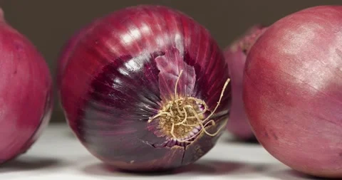 Red onion, which is also called purple onion. Onions is very healthy product Stock Footage 308652778