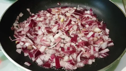 Red onions, beets, fried in a pan Video stock 86307172