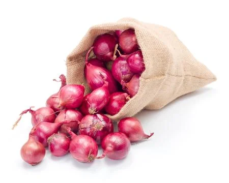 Red onions in burlap sack Stock Photos
