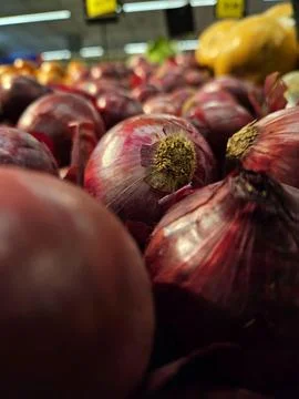 Red Onions on Display Stock Photos
