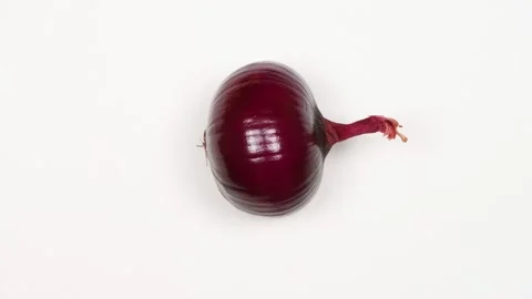 Red onions move by gravity Stock Footage 145369187
