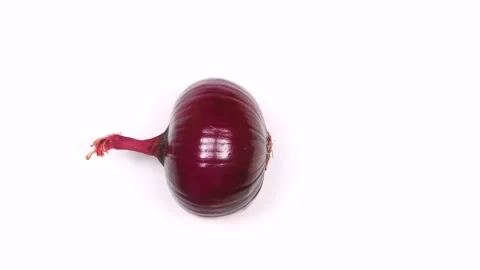 Red onions move by gravity Stock Footage 145369373