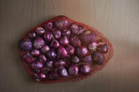 Red Onions in Net Stock Photos