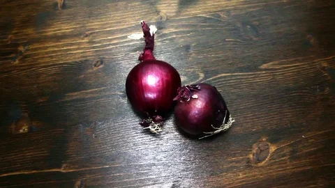 Red onions with a rotating view Stock Footage 86523692