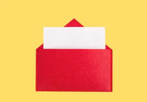 Red open envelope with a sheet of paper with mock-up on a yellow background w Stock Photos