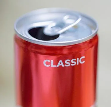 Red opened aluminum can with empty space Stock Photos
