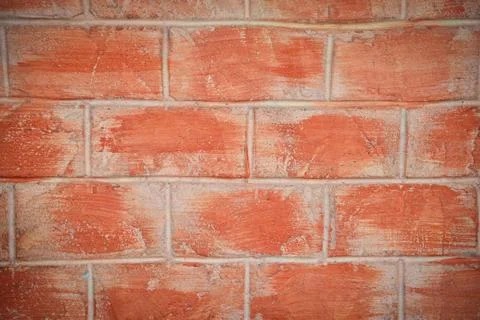 Red or orange brick pattern wall with cement concrete plaster for texture bac Stock Photos