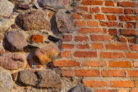 Red orange brick wall background texture with free copy space for text Stock Photos