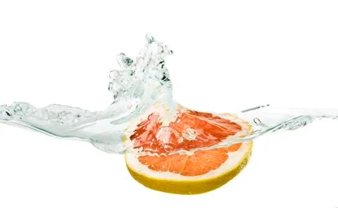Red orange falling into water Stock Photos