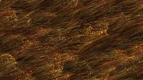 The red-orange fiber optic coating bends the airflow forcefully. Stock Footage 157712947