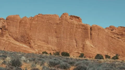 Red Orange Monolithic Rocks Formation In Dry Desert On Sunny Day In Motion Stock Footage 164223343