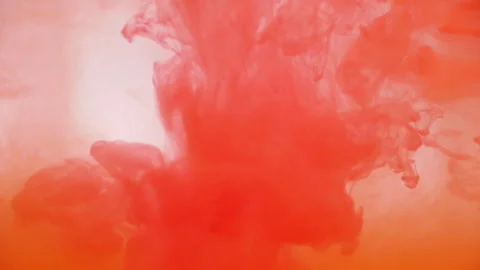 Red Orange Paint Dissolved In Water Video stock 242394338