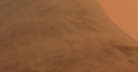 Red orange sand dune wave patterns with wind blowing sand. Stock Footage 102168944