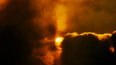 Red-orange sunset in black clouds. 스톡 동영상 113820650