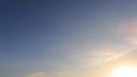 Red orange yellow sun light ray in Morning sunrise blue sky background Video stock 168900623