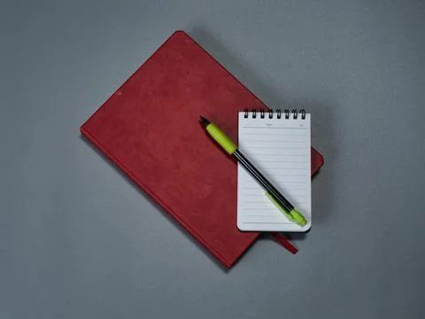 Red organizer, small notepad and mechanical pencil Stock Photos