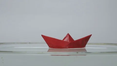 Red Origami Ship on The Water Stock Footage 74249686