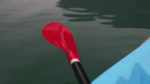 Red paddle drying on board. Stock Footage 303723527