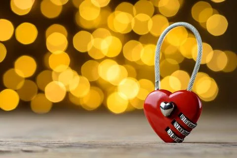 Red padlock in the form of heart Stock Photos