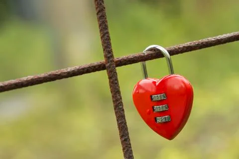 Red padlock in heart shape. Stock Photos