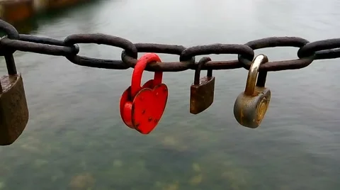 Red padlock in the shape of heart Stock Footage 59594387