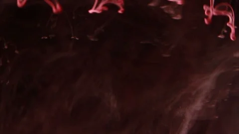 Red paint on the dark background Stock Footage 85843464