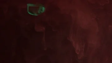 Red paint on the dark background Stock-Footage 85843473