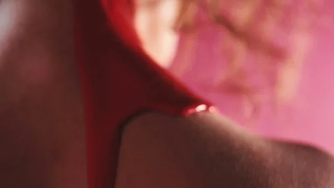Red paint drains over the shoulders of a girl Stock Footage 81698404
