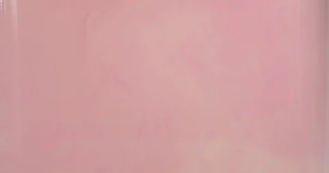 Red paint dripping into liquid Stock Footage 114088371