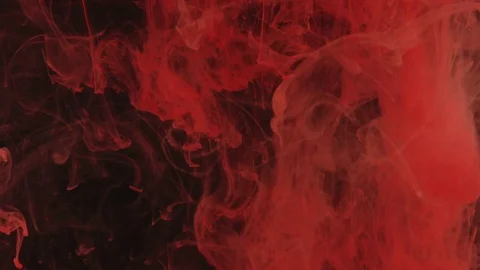 Red paint drops in the water Stock-Footage 70966297