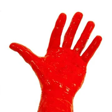 Red paint on hand Stock Photos