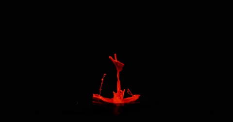 Red paint in motion in 4K - B Stock Footage 59919073